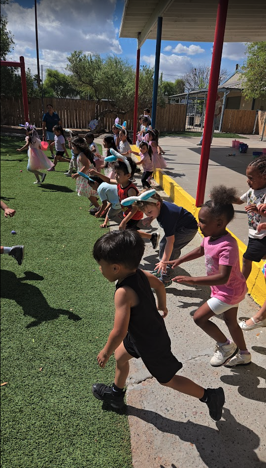 Children running during an outdoor egg-hunt activity